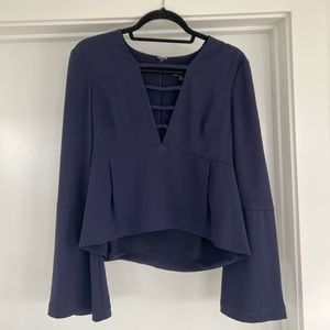 Intermix blouse with deep v-neck